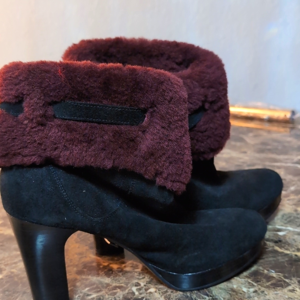 Like new ,worn twice,ugg fur top boots